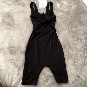 Black biker romper. Size XS. Never worn!